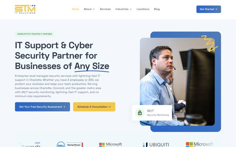The STM IT Solutions homepage: "IT Support & Cyber Security Partner for Businesses of Any Size" beside a photo of a support engineer on a headset.